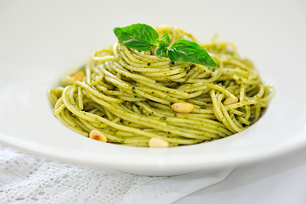 Pasta with Basil Pesto on Plate, Garnished with Basil Leaves