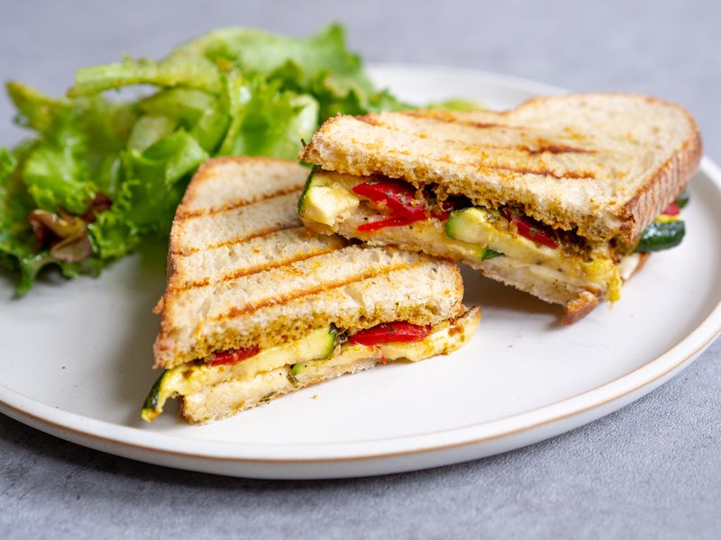 
 Grilled Zucchini and Bell Pepper Panini with Pesto